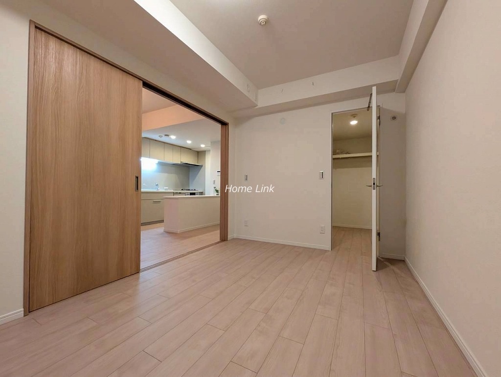 コスモ小竹向原メユール1階 ウォークインクローゼットを備えた洋室